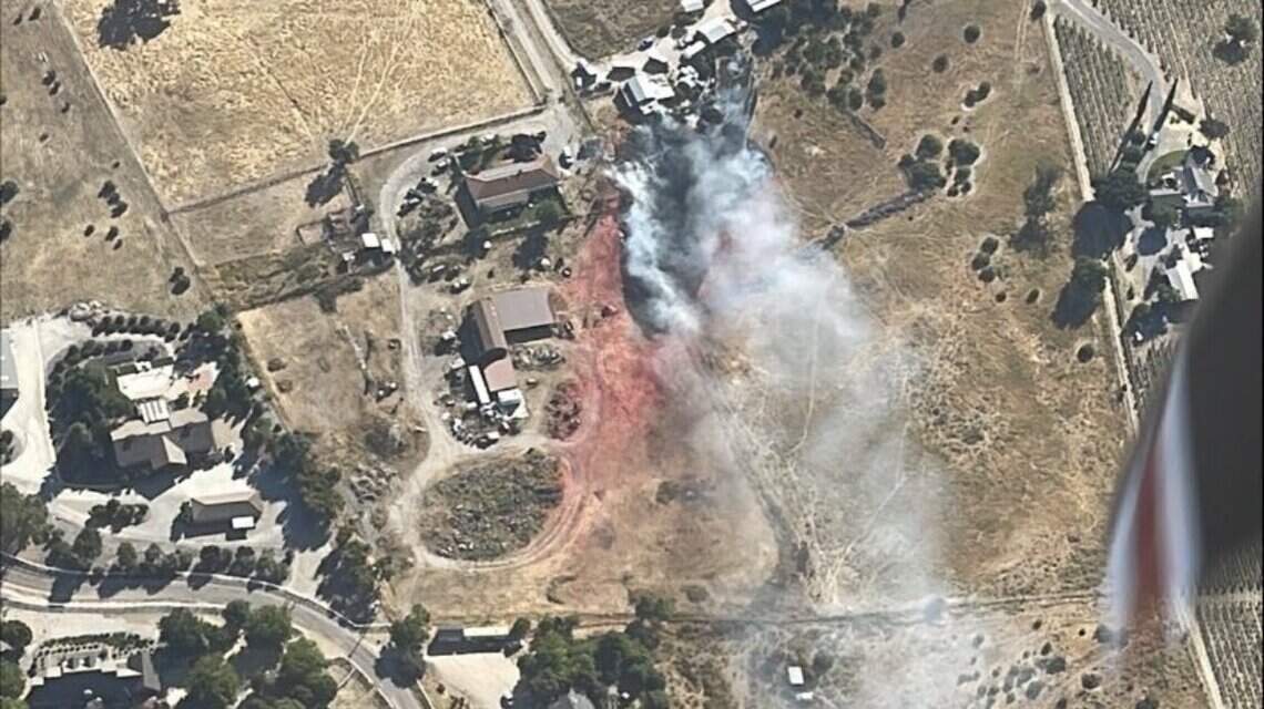Vegetation fire threatens structure near Templeton