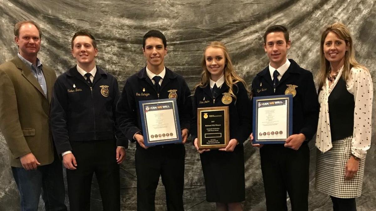 The Nipomo Livestock Evaluation Team, here with their Reserve National Champion plaque, includes, from left, assistant coach Clint Cummings, Tucker Banta, Eric Sahagun, Erica Bowles, Kyler Vernon and adviser Rosemary Cummings.