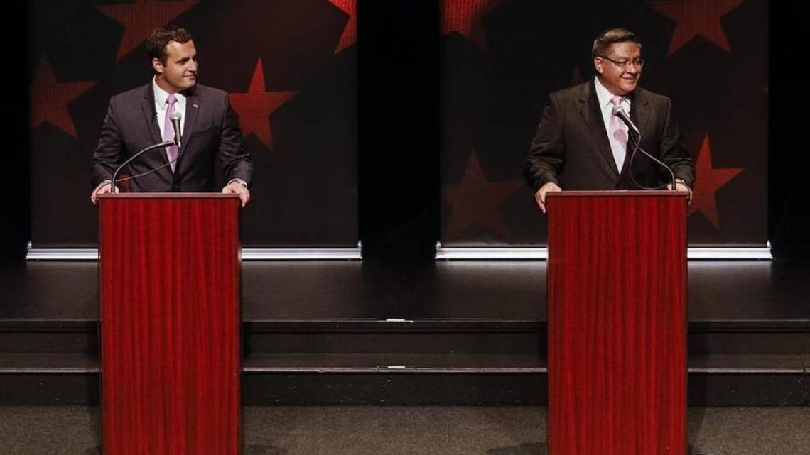 Republican businessman Justin Fareed, left, debates Democrat and then-Santa Barbara County Supervisor Salud Carbajal at Cal Poly’s Spanos Theater in October 2016.