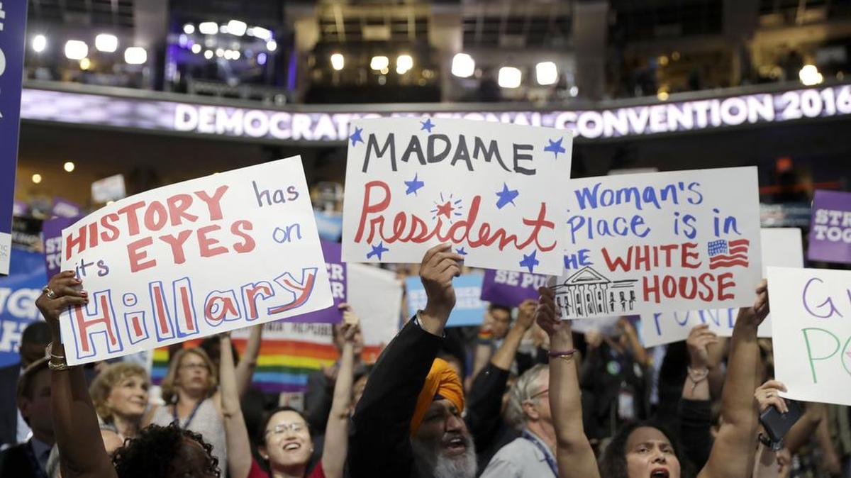 California delegates hold up signs as they cheer during the third day of the Democratic National Convention on Wednesday in Philadelphia.