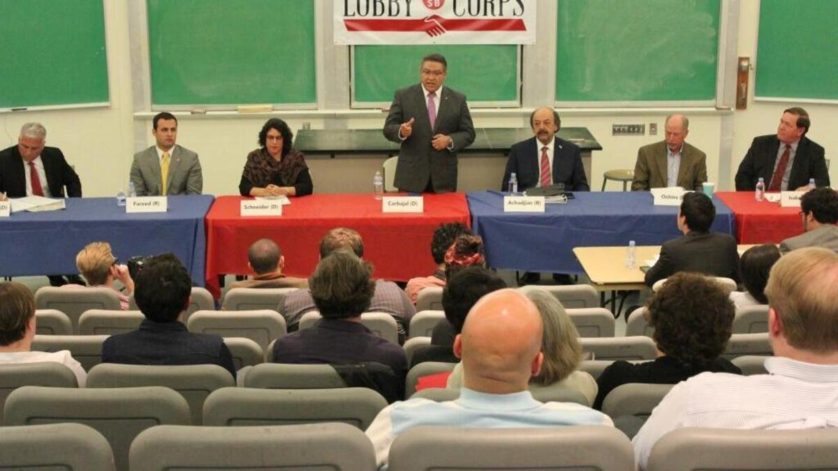 Salud Carbajal stands to address the audience during a 24th District congressional candidate debate at UC Santa Barbara on Thursday evening.