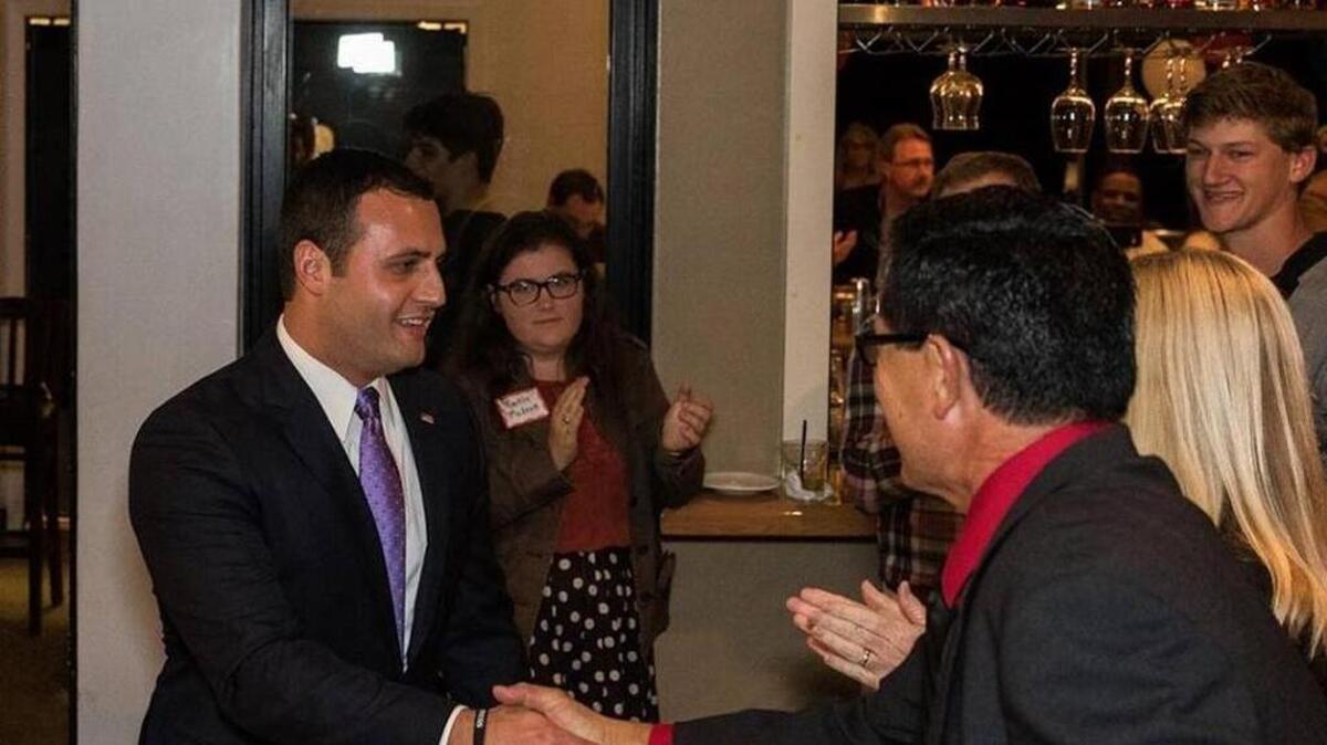 Republican Justin Fareed greets supporters Tuesday night in Santa Barbara.