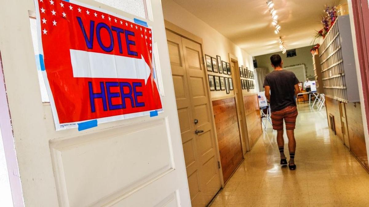 A voter enters the polling area at the Zion Lutheran Church in San Luis Obispo during the June primary.