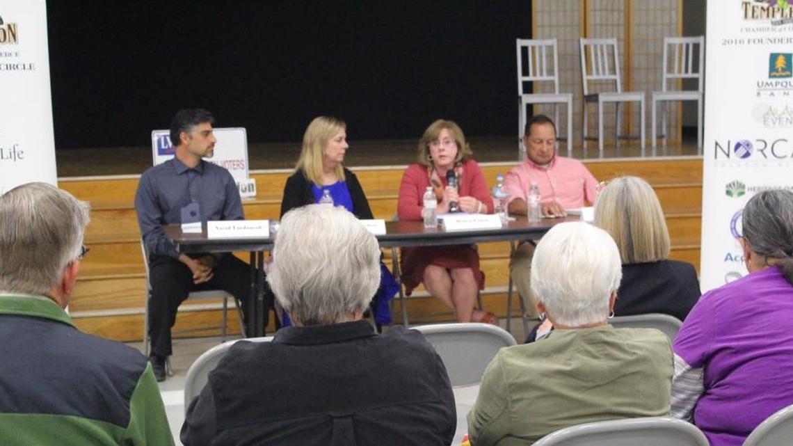 Templeton voters listen Wednesday to community services district candidate Debra Logan (third from left) speak at a Chamber of Commerce forum. From left, candidates Navid Fardanesh, Pamela Jardini and Rob Rosales look on.