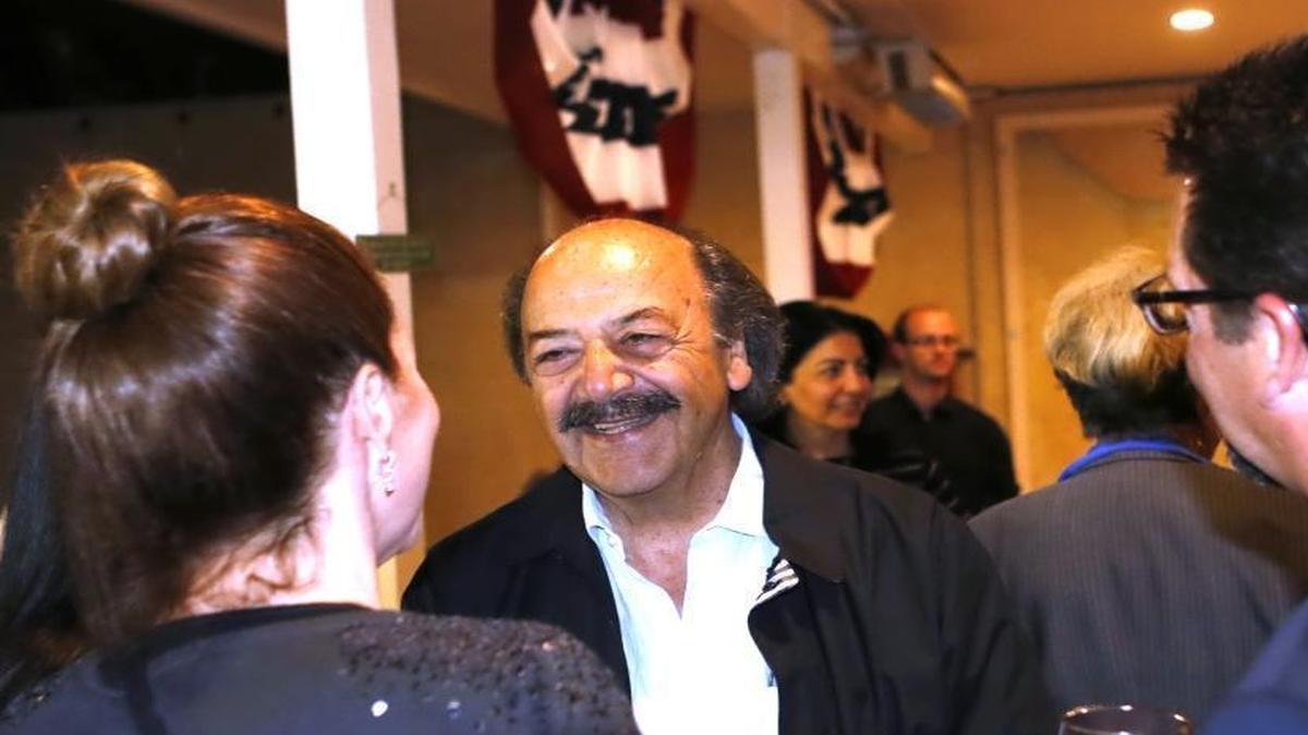 Katcho Achadjian talks to supporters while watching election returns at a party in Arroyo Grande. He was battling with Justin Fareed for second place in the race to succeed Lois Capps.