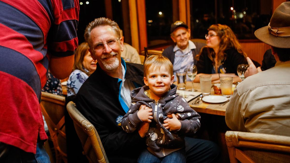 John Weiss, who is running for Morro Bay mayor, poses for a photo with his grandson Brandt, 3, during an election night party at the Harbor Hut. Weiss is a vocal critic of the planned sewage treatment site.