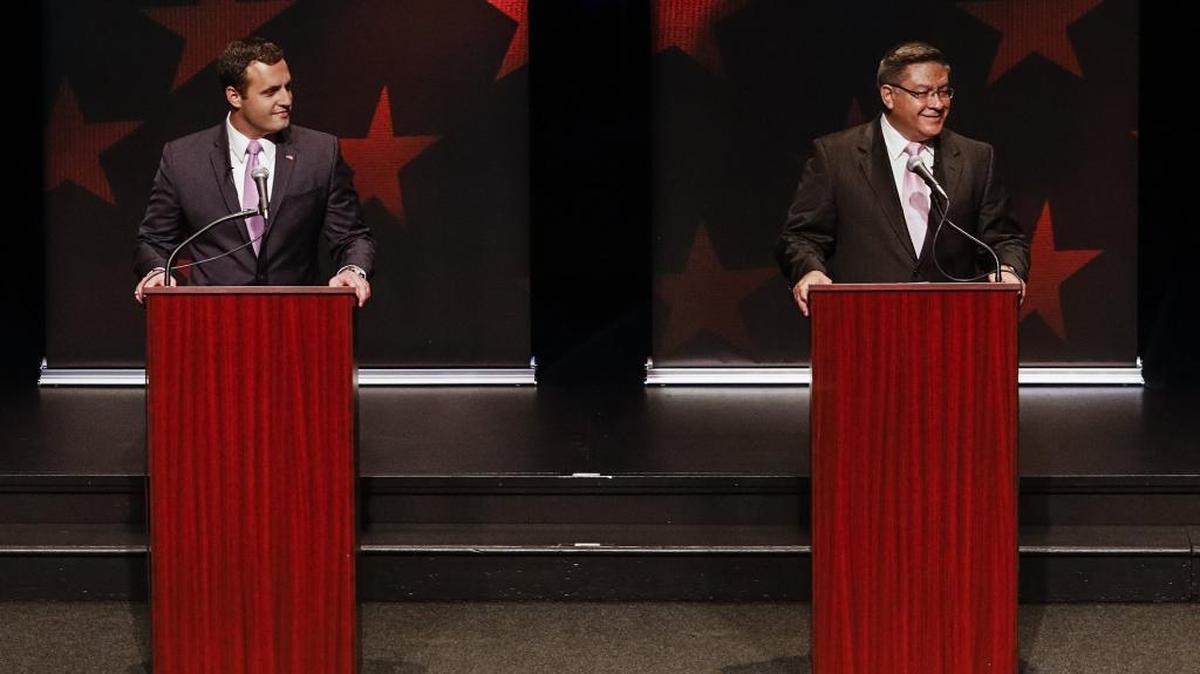 Republican businessman and rancher Justin Fareed, left, and Democrat and Santa Barbara County Supervisor Salud Carbajal met Thursday night for the 24th Congressional District debate at Cal Poly’s Spanos Theater.