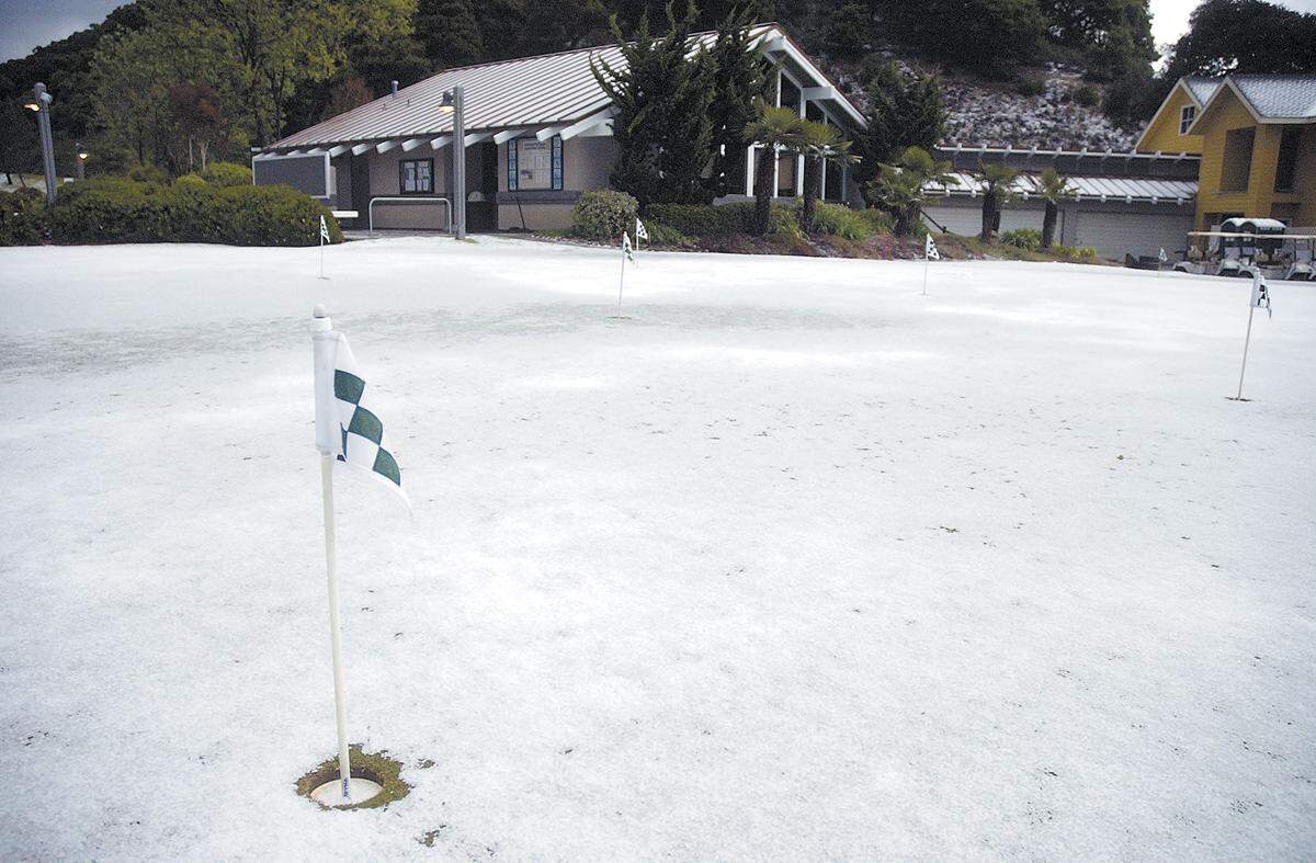 At the Avila Beach Golf Resort the practice putting green was a blanket of white. A cold winter storm dropped a combination of snow and hail in the south county before sunrise on March 11, 2006.