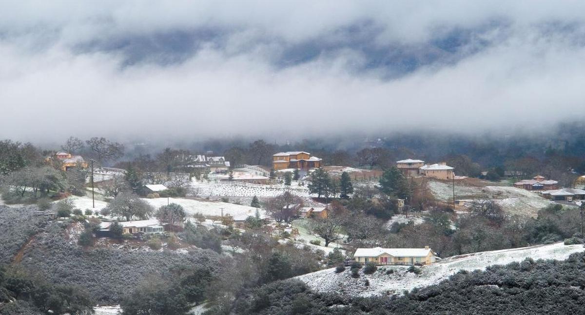 Snow covered hill north of San Marcos Road in Atascadero in 2009. That could happen again in the middle of this week.