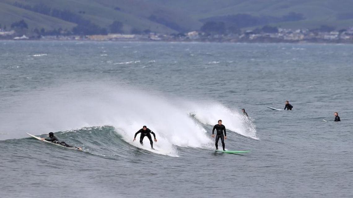 Surfer experience offshore wind while surfing near Morro Bay in early January.