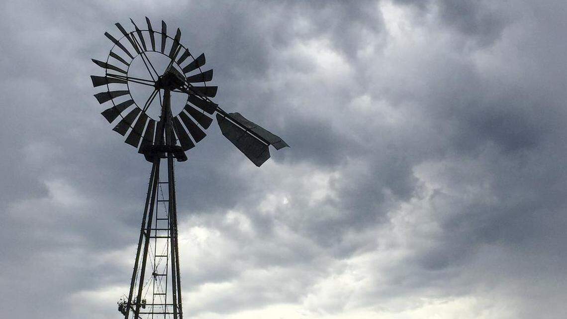 Storm clouds gather near the corner of South Higuera and Tank Farm Road in San Luis Obispo. The National Weather Service has issued a flash flood watch for the Central Coast that will go into effect Tuesday morning.