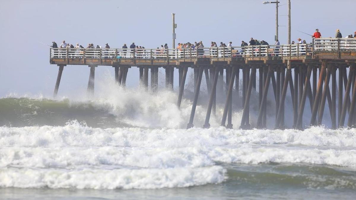 A combination of huge waves and high tide make for a spectacular splash on the Pismo Beach Pier Sunday, Nov. 6, 2016. High surf and heavy rains are expected on the Central Coast through Monday, according to forecasts.