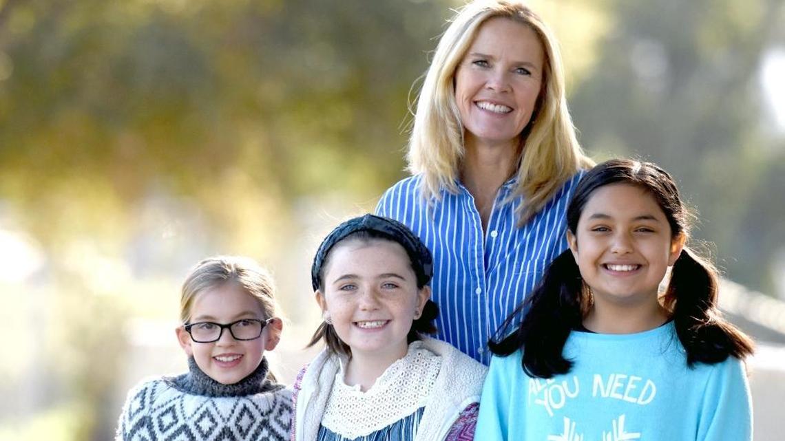 Sinsheimer Elementary School students Phoebe Demarest, Ruby Latta and Brooklyn Michelle and their fourth-grade teacher Katie Peters.