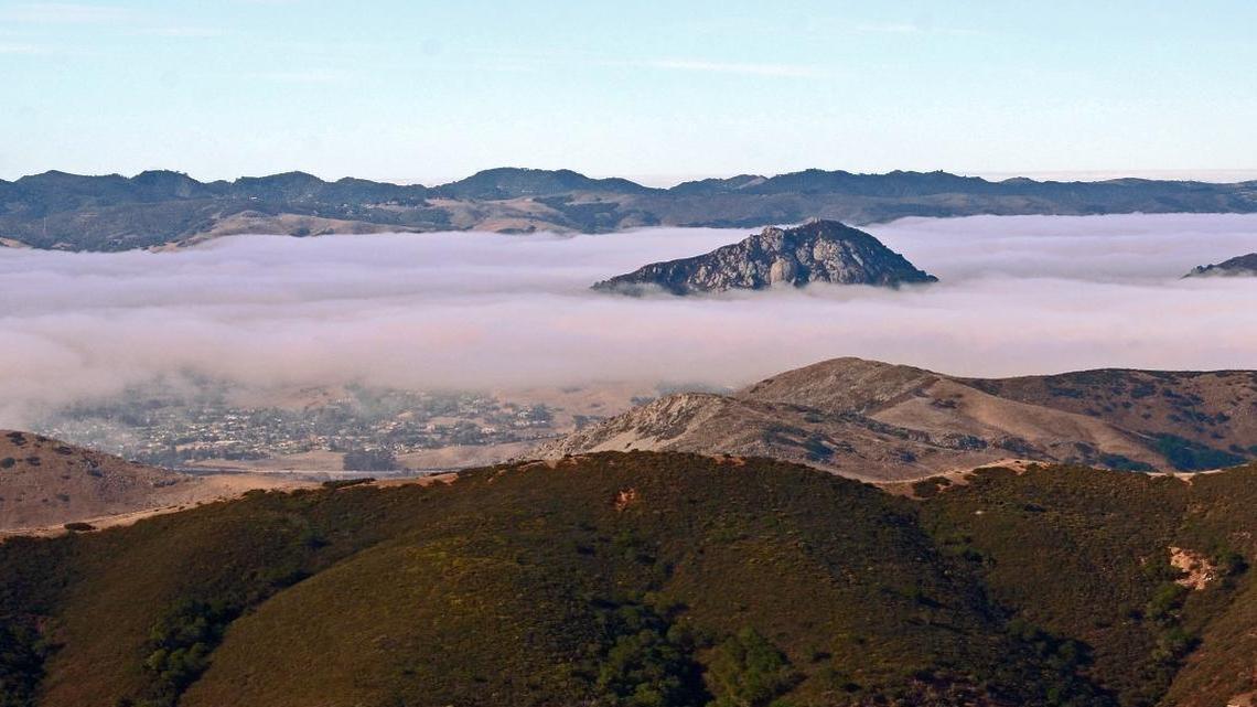 A thick bank of marine layer over San Luis Obispo, viewed from the Cuesta Grade.