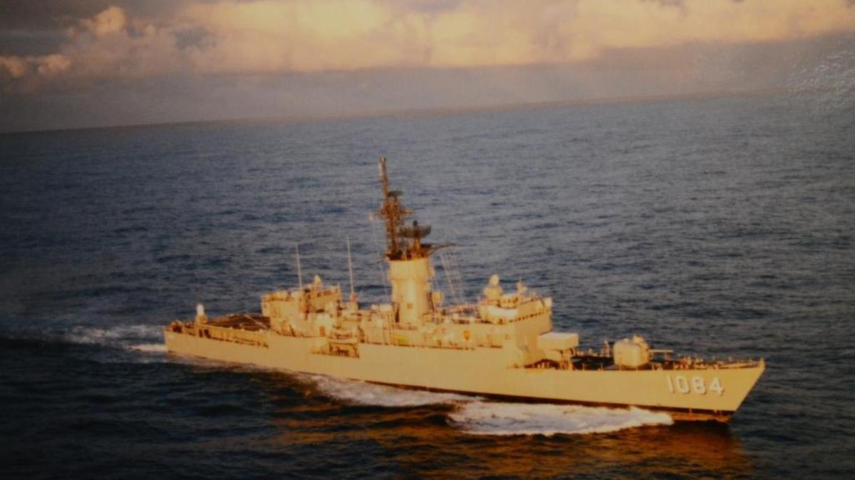 The USS McCandless on the Atlantic Ocean near the Azores Islands at sunset. The photo was taken from a Navy helicopter.
