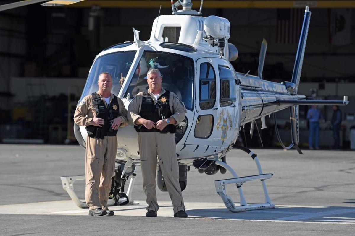California Highway Patrol Pilot Dave Perotti, left, and Flight Officer Scott Clays in Paso Robles.