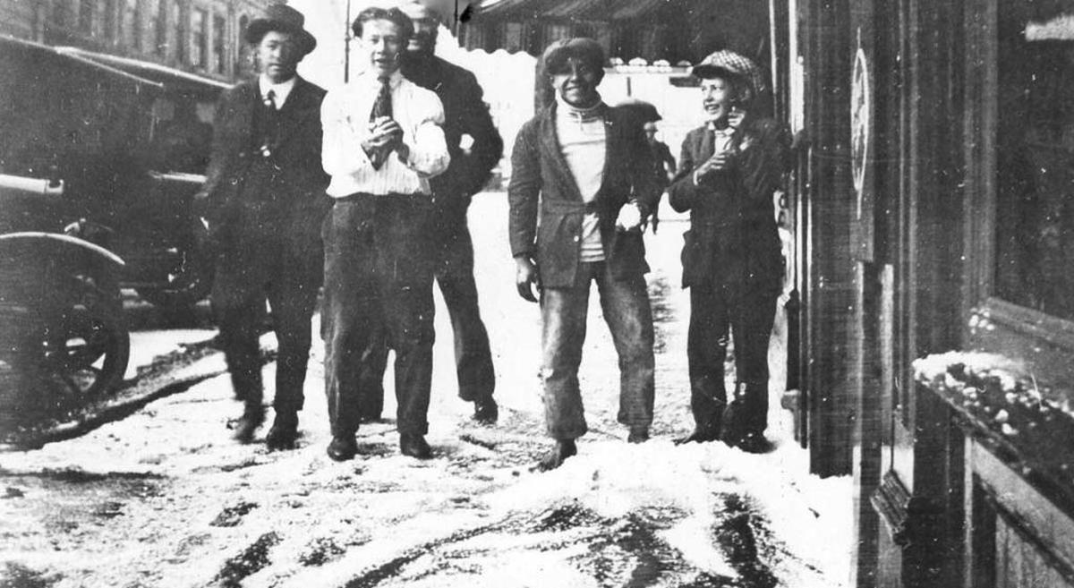 Unidentified men enjoying snow on the streets of San Luis Obispo in 1922.
