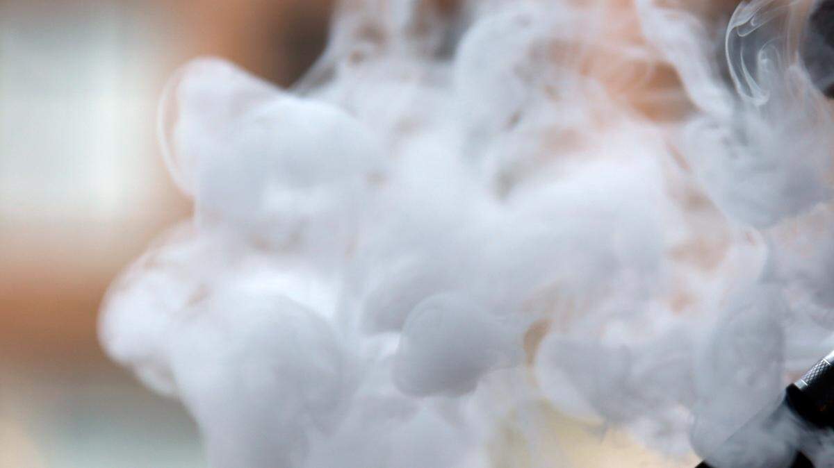 A man smokes an electronic cigarette in Chicago.