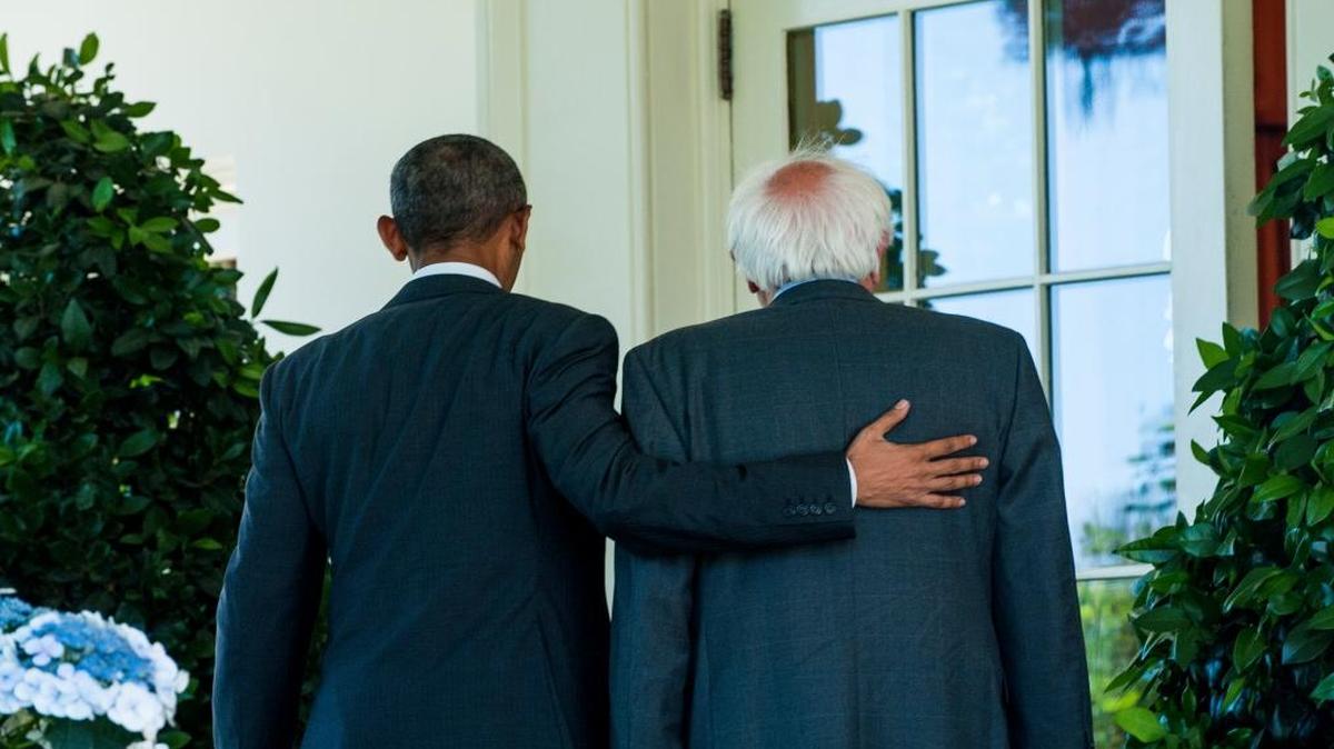 President Barack Obama and presidential candidate Sen. Bernie Sanders walk along the colonnade next to the Rose Garden at the White House on Thursday. Sanders met with Obama shortly before the president endorsed Hillary Clinton for president.