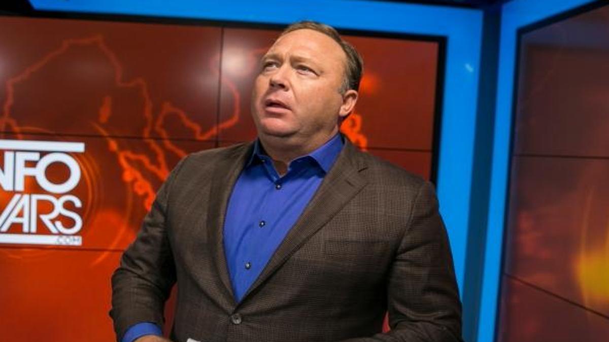 Alex Jones, conservative conspiracy theorist host of Infowars.com, prepares to host his live show in his studio in Austin, Texas, on Feb. 17.