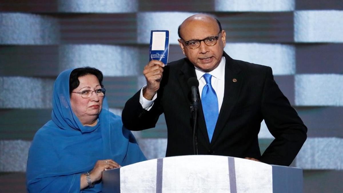 Khizr Khan, father of fallen U.S. Army Capt. Humayun Khan, holds up his copy the U.S. Constitution as he speaks Thursday during the final day of the Democratic National Convention in Philadelphia.