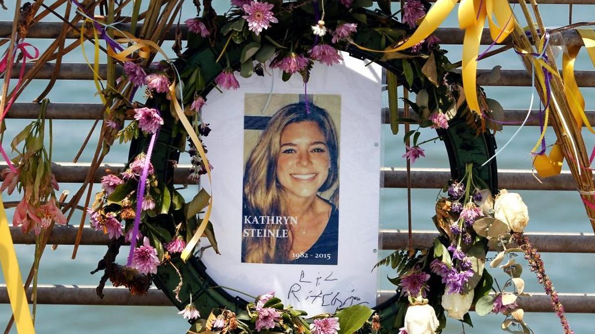 A portrait of Kate Steinle is shown in this 2015 file photo at a memorial on Pier 14 in San Francisco. Opening arguments start Monday in the trial of the man charged with her murder, Jose Ines Garcia Zarate.
