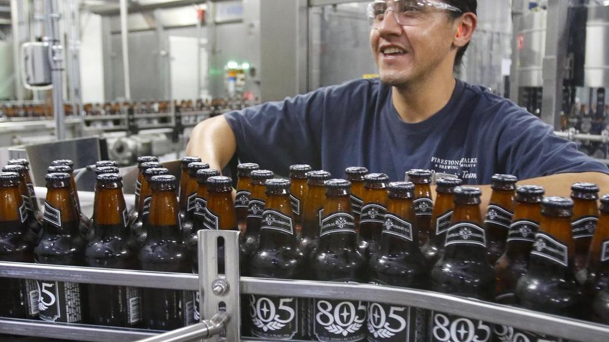 Leo Farias, a filler technician, operates the 805 bottling line at Firestone Walker Brewing Co. in Paso Robles.