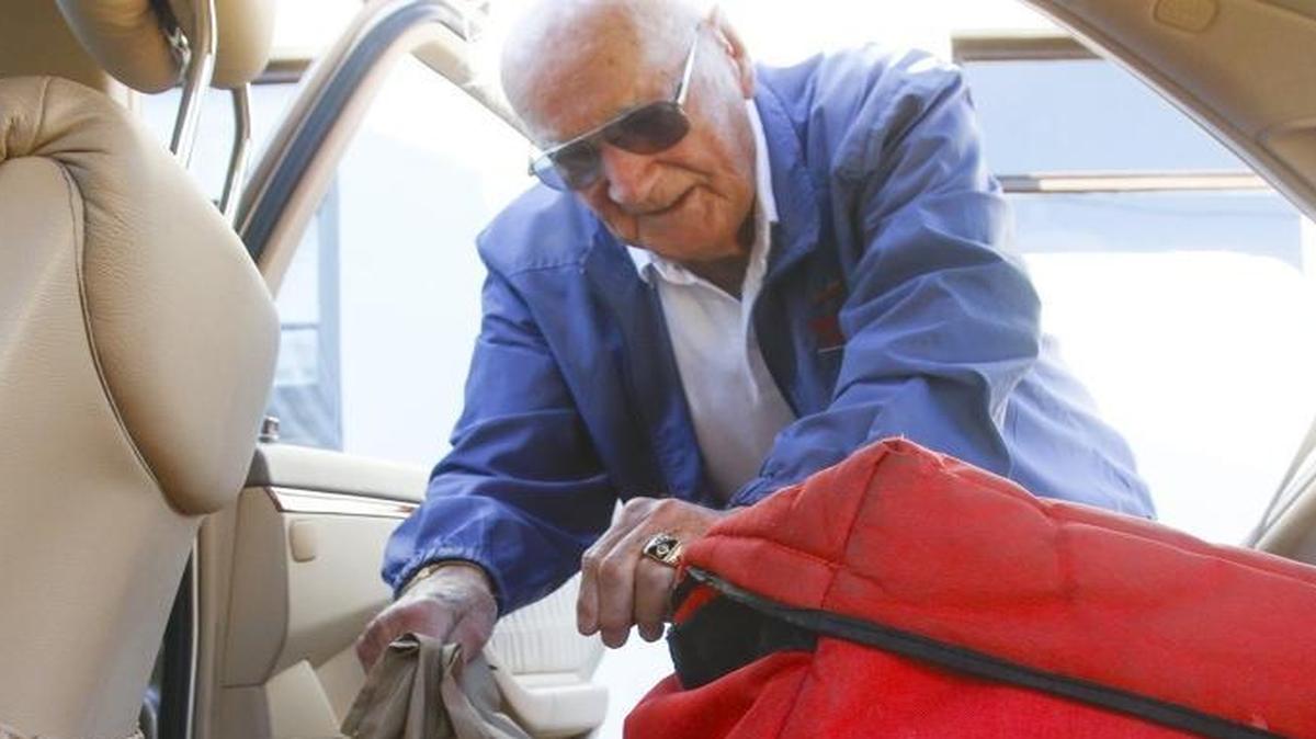 Forrest Frost, 96, loads meals for delivery on a recent Thursday morning at the Veterans Memorial Building in Pismo Beach. He volunteers for Five Cities Meals on Wheels.