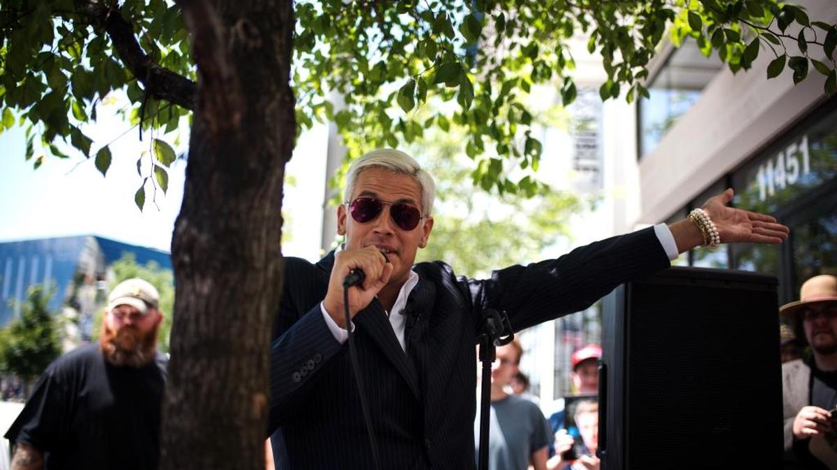 Milo Yiannopoulos, the Breitbart writer and “Alt-Right” personality, speaks with reporters at the Republican National Convention in Cleveland, July 19, 2016.