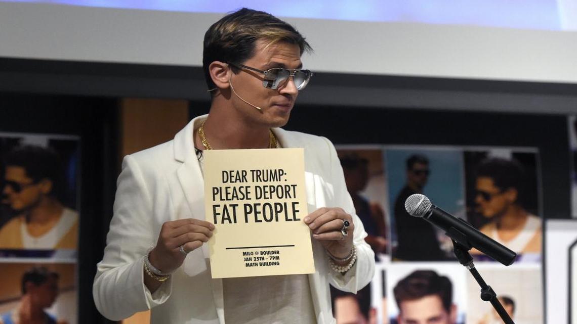 Milo Yiannopoulos holds a sign as he speaks at the University of Colorado campus on Wednesday, Jan. 25, 2017. The Breitbart editor is scheduled to speak at Cal Poly on Tuesday, Jan. 31, 2017.