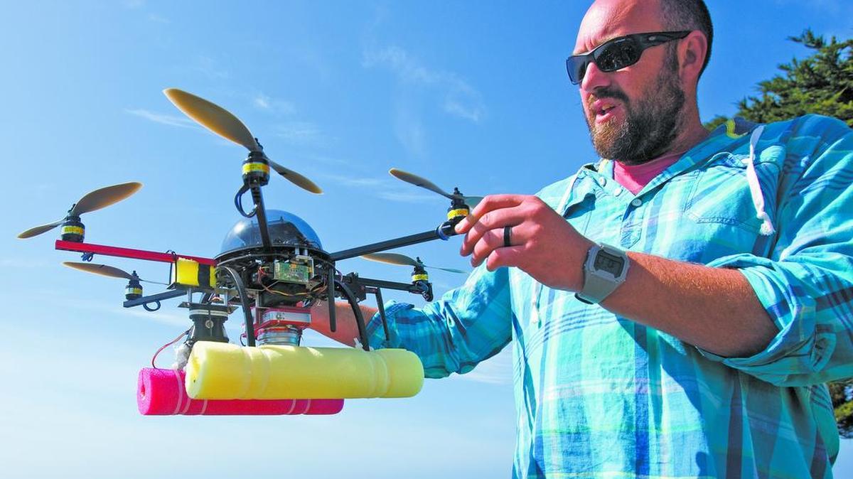 Hexacopter pilot John Durban holds a drone used to photograph migrating gray whales at Piedras Blancas. Some drones, such as this one, help marine mammals by adding important observations. In amateur hands, however, they can get too close and pose a threat to the animals.