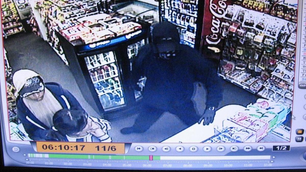 Security footage captures a man dressed in black as he robs a gas station in San Miguel in November.