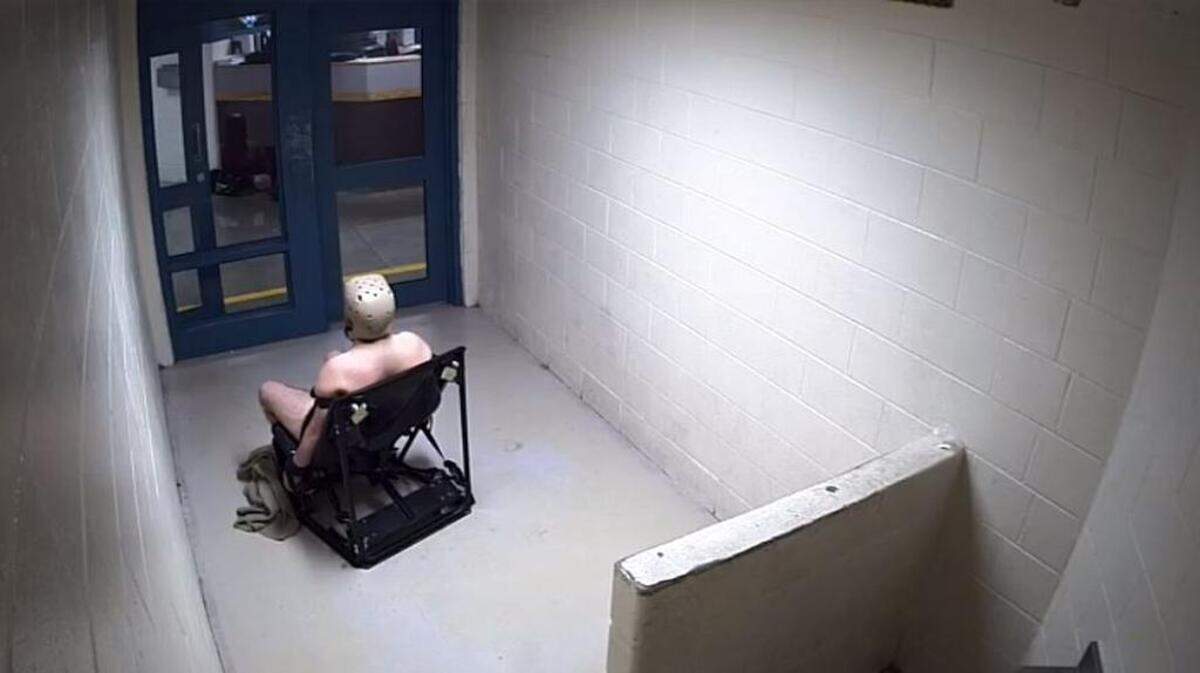 Andrew Holland sits restrained to a chair in a San Luis Obispo County Jail holding cell on Jan. 21, 2017, about 16 hours after being placed in the chair by Sheriff's deputies.