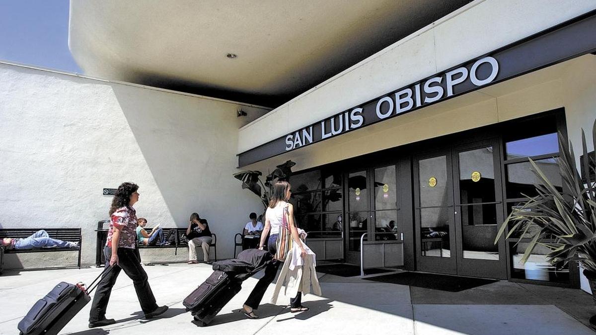 Travelers make their way into the San Luis Obispo County Regional Airport terminal.
