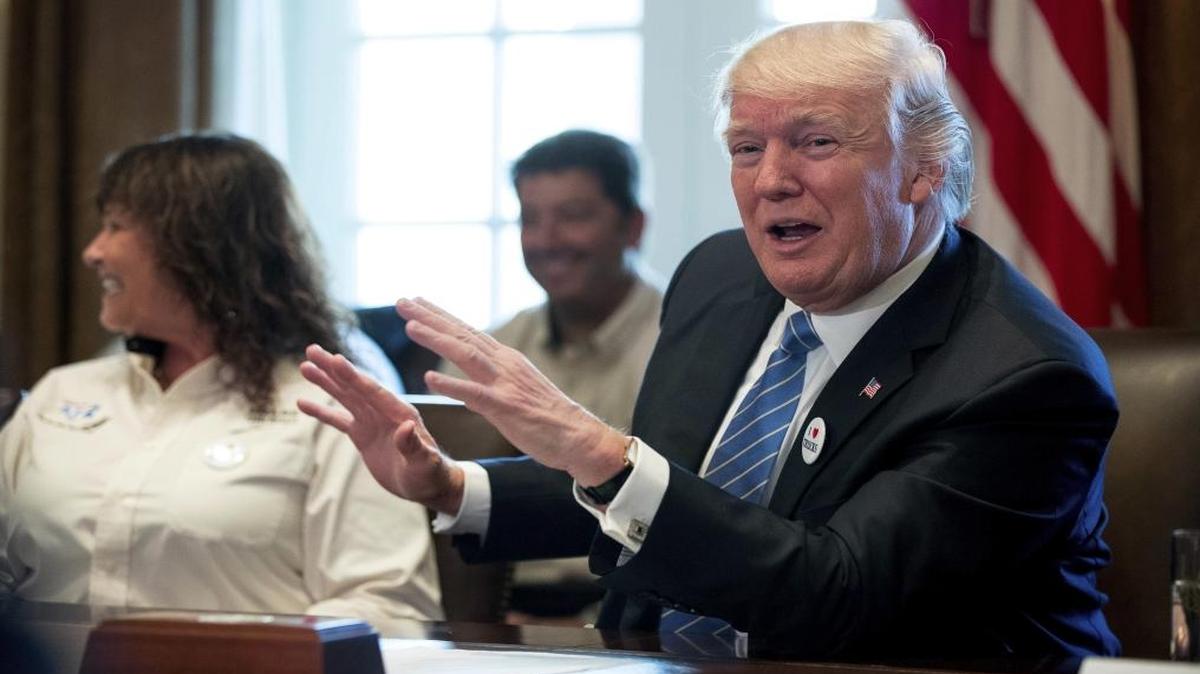 President Donald Trump meets with truckers and industry CEOs regarding healthcare, Thursday, March 23, 2017, in the Cabinet Room of the White House in Washington.