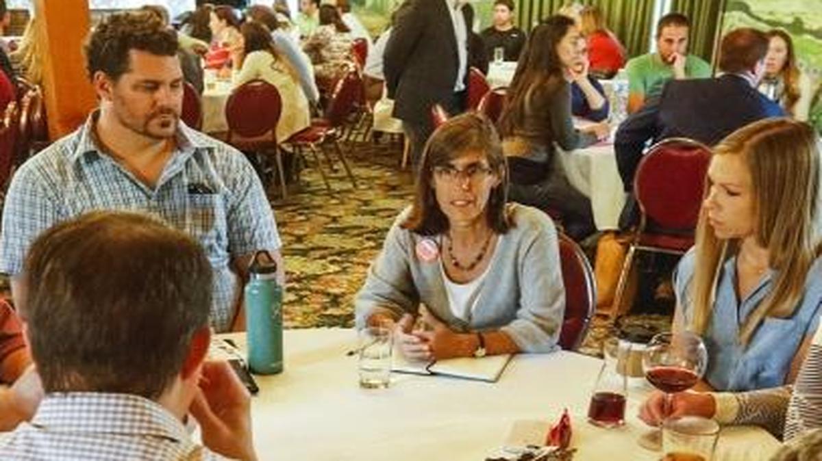 Andy Pease, center, speaks at a SLO Under 40 group during a round table forum for San Luis Obispo City Council and mayoral candidates at the Madonna Inn on Oct. 5.