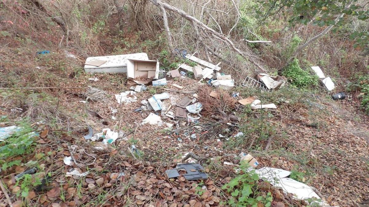 The Santa Rosa Creek bed near the intersection with Main Street in Cambria became an illegal dump site for a variety of garbage.