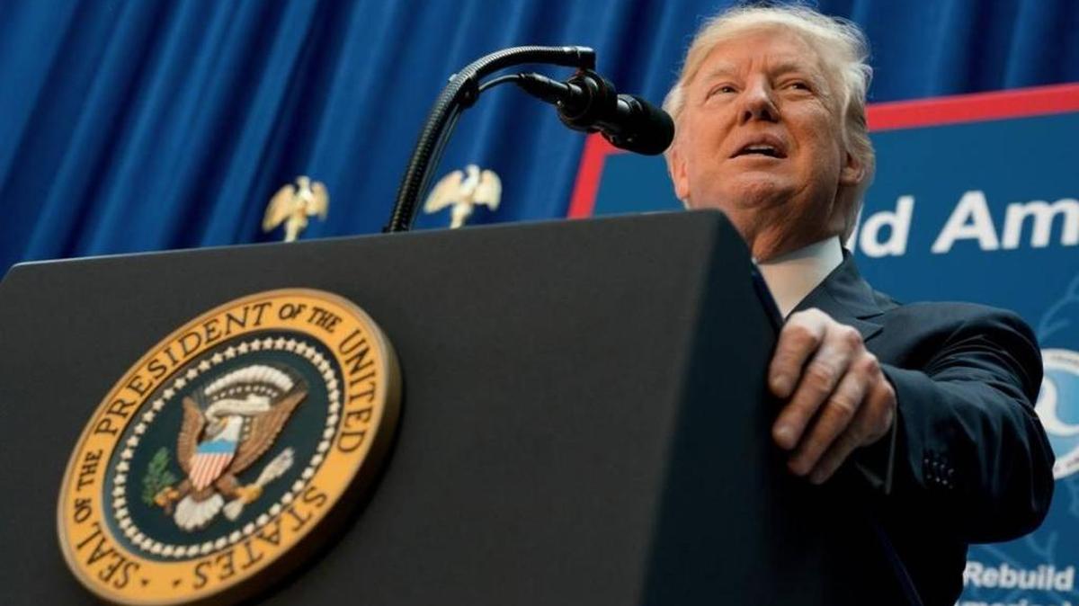 In this Friday, June 9, 2017, photo, President Donald Trump speaks on infrastructure at the Department of Transportation in Washington.