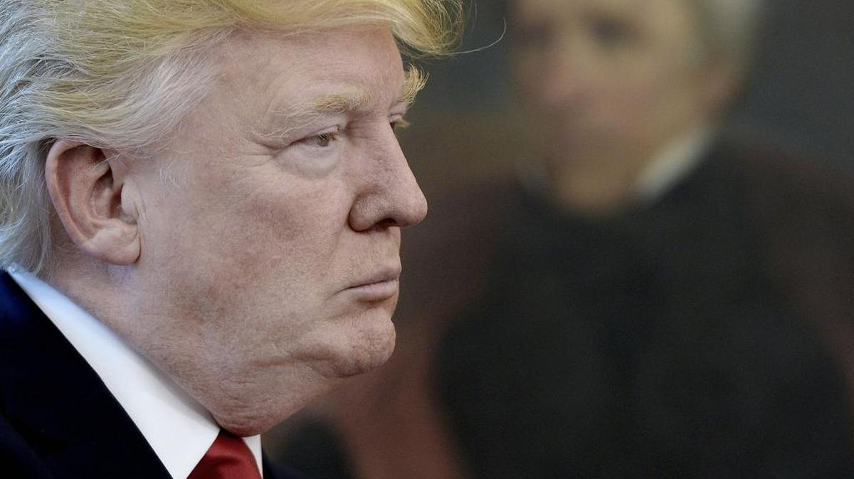 U.S. President Donald Trump looks on after speaking about trade in the Oval Office of the White House March 31, 2017 in Washington, D.C.