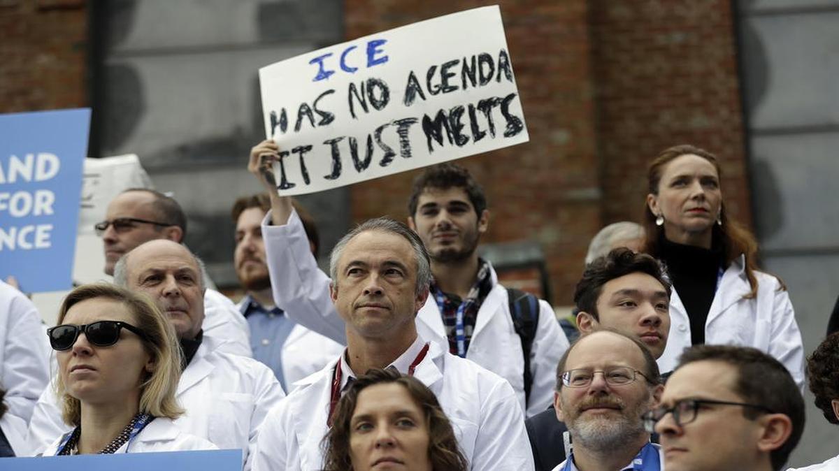 Scientists hold signs during a rally in conjunction with the American Geophysical Union's fall meeting Tuesday, Dec. 13, 2016, in San Francisco. The rally was to call attention to what scientist believe is unwarranted attacks by the incoming Trump administration against scientists advocating for the issue of climate change and its impact.