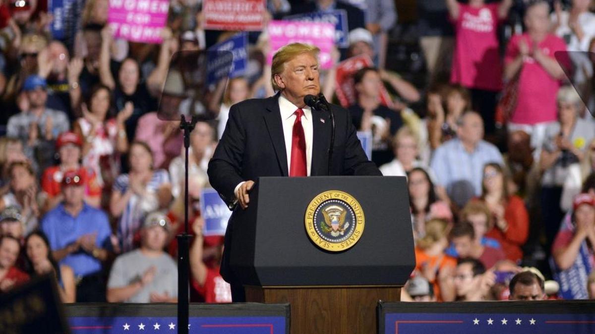 President Donald Trump pauses as he speaks onstage during a rally in Great Falls, Montana, on July 5, 2018.