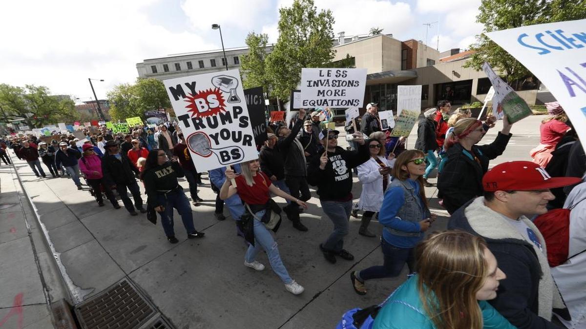 Protesters move down 14th Street during a march for science Saturday, April 22, 2017, in Denver. The Mile High City is joining communities around the globe where people are marching to defend scientific work from attacks including U.S. government budget cuts.
