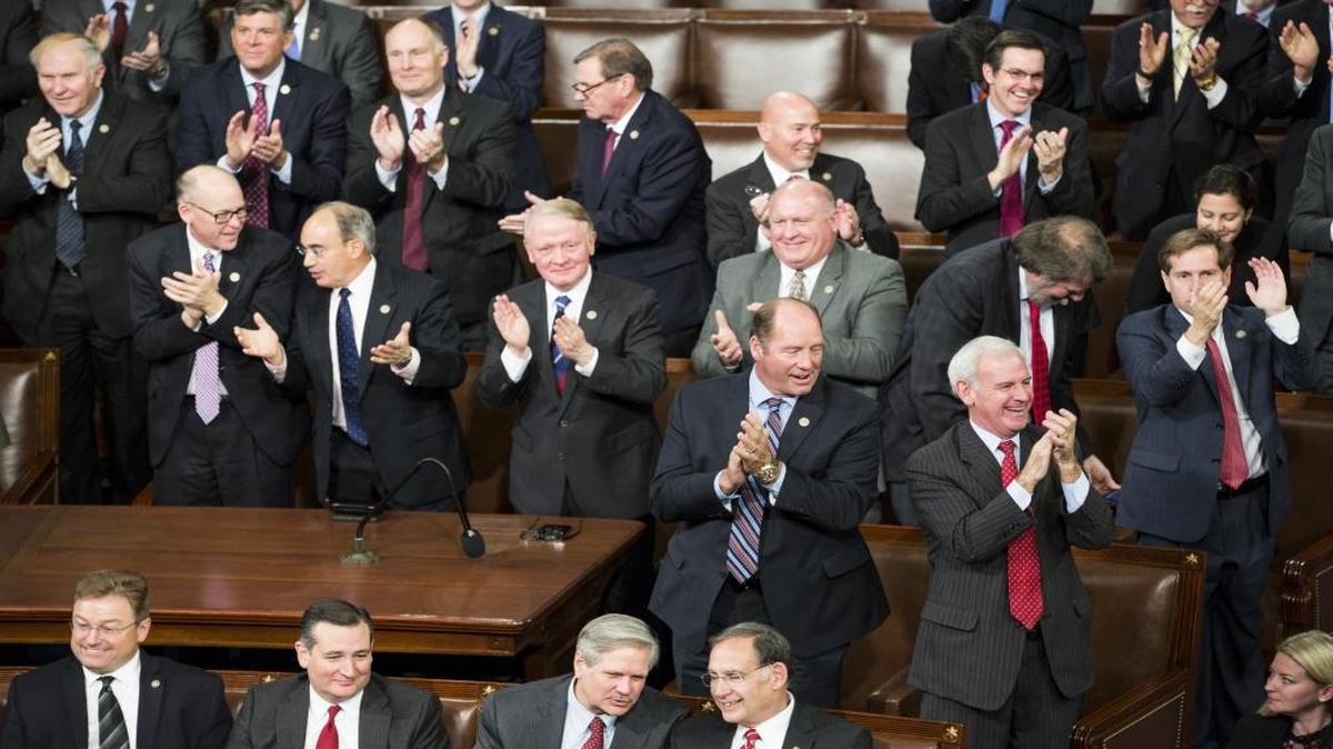 Republican lawmakers applaud after an objection to a ballot count was overturned during a joint session of Congress to count the Electoral College ballots in Washington, Friday, Jan. 6, 2017.