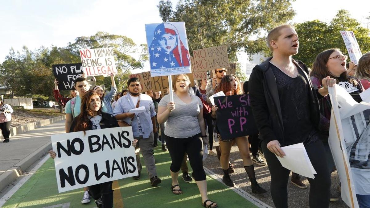 Protesters march at Cal Poly in advance of Milo Yiannopoulos’ talk at Spanos Theatre on Jan. 31, 2017.