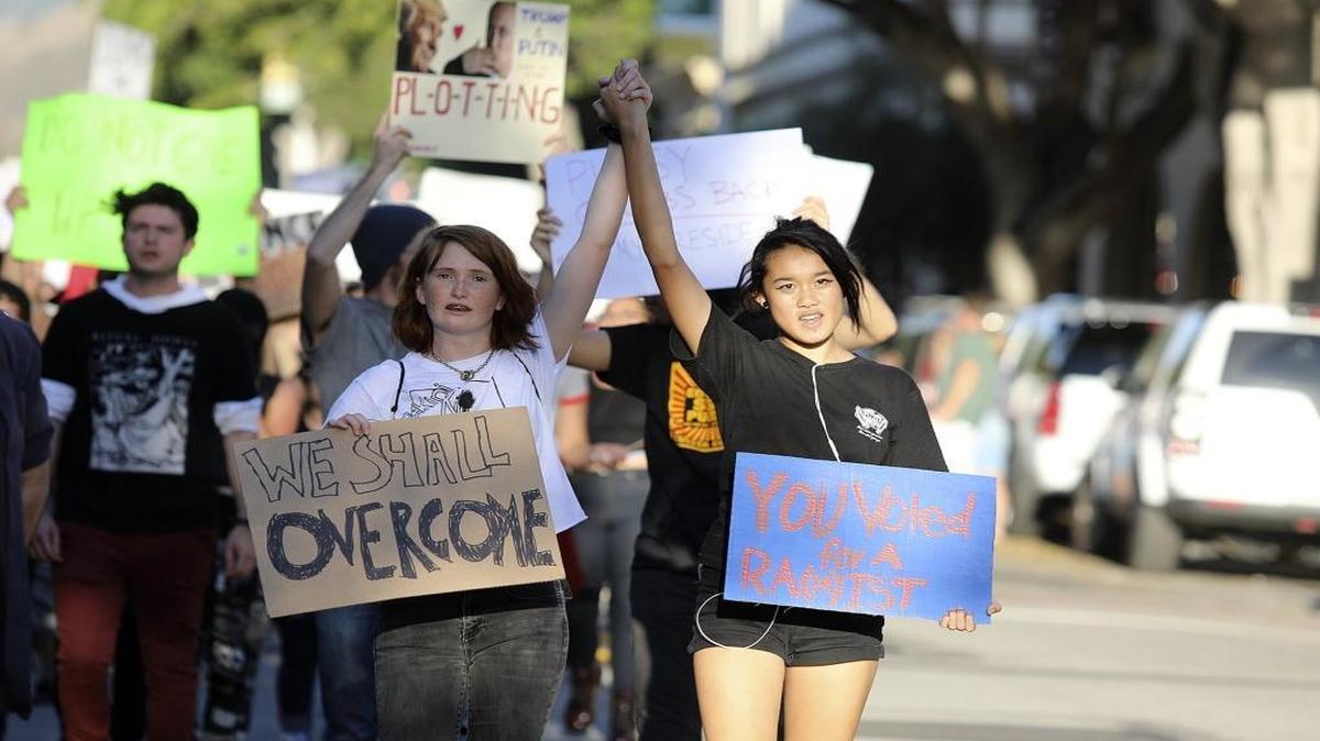 Hundreds of people marched in protest of Donald Trump's election to the presidency in downtown San Luis Obispo.