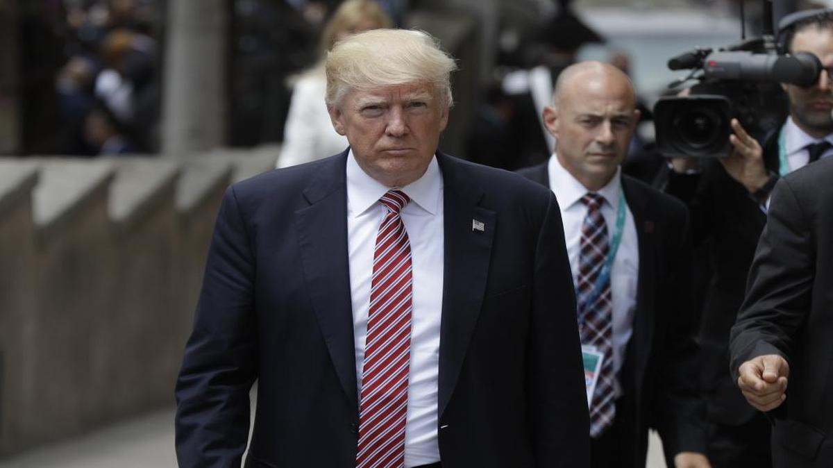 US President Donald Trump arrives for a welcome ceremony for the G7 summit in the Ancient Theatre of Taormina (3rd century BC) in the Sicilian citadel of Taormina, Italy, Friday, May 26, 2017.