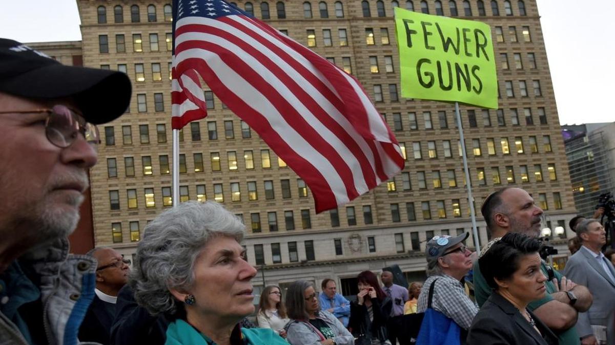 Gregg and Gail Meister, left, of Merchantville, N.J., with Congregation Rodeph Shalom in Philadelphia join political leaders, CeaseFirePA, and churches and synagogues at a vigil in Philadelphia's Thomas Paine Plaza for victims of the Las Vegas shootings, Tuesday, Oct. 3, 2017.