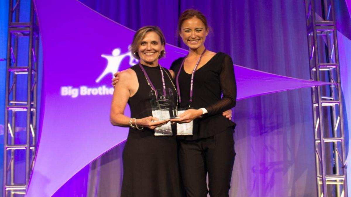From left, Big Brothers Big Sisters of San Luis Obispo County’s Development Director Patty Carpenter and Board President Christie Clemons accepting the Agency of the Year award in 2016.
