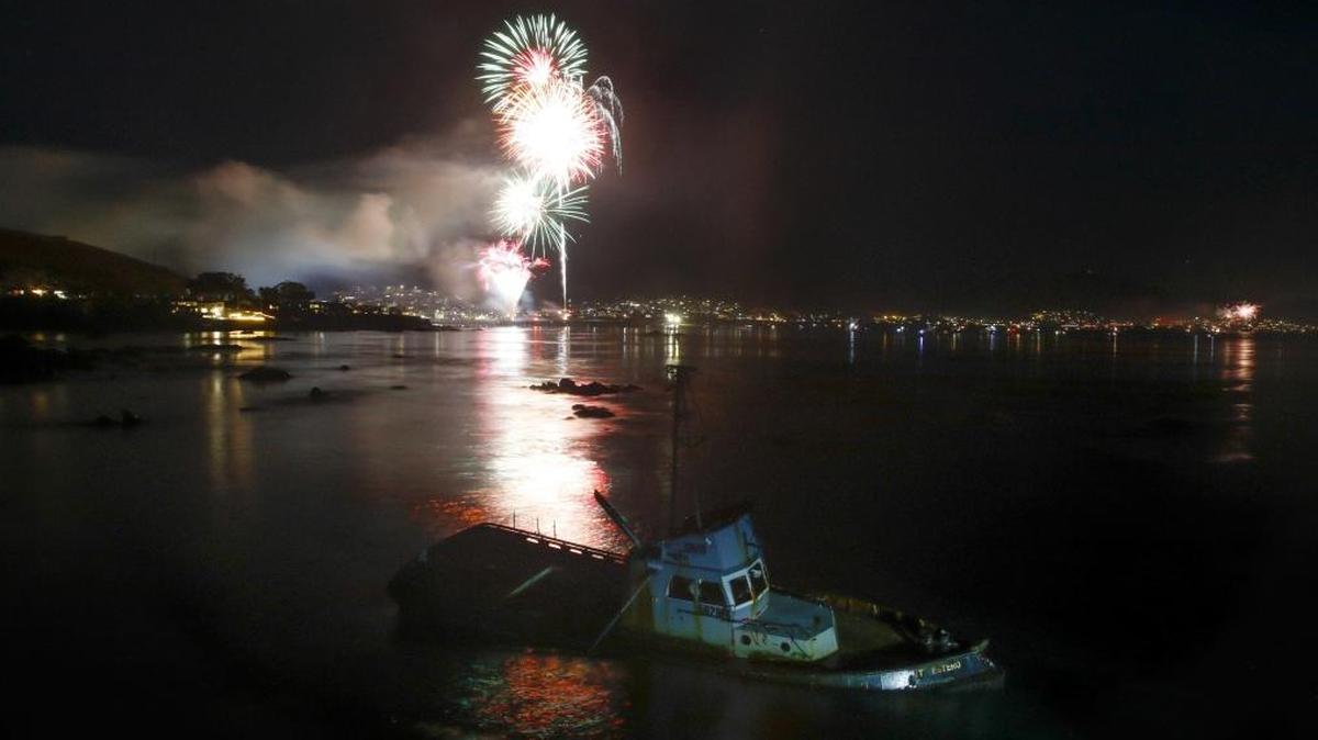 Fireworks in Cayucos on July 4 over the grounded fishing boat Point Estero.