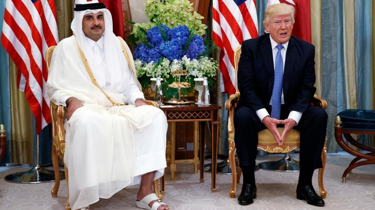 In this May 21, 2017, file photo, President Donald Trump, right, holds a bilateral meeting with Qatar's Emir Sheikh Tamim Bin Hamad Al Thani, in Riyadh, Saudi Arabia.
